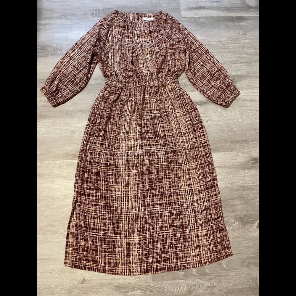 Chic midi length multi print dress with two front pockets